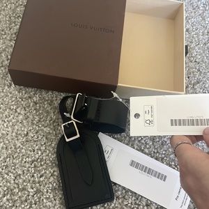 New Authentic Louis Vuitton black leather luggage tag and luggage strap holder